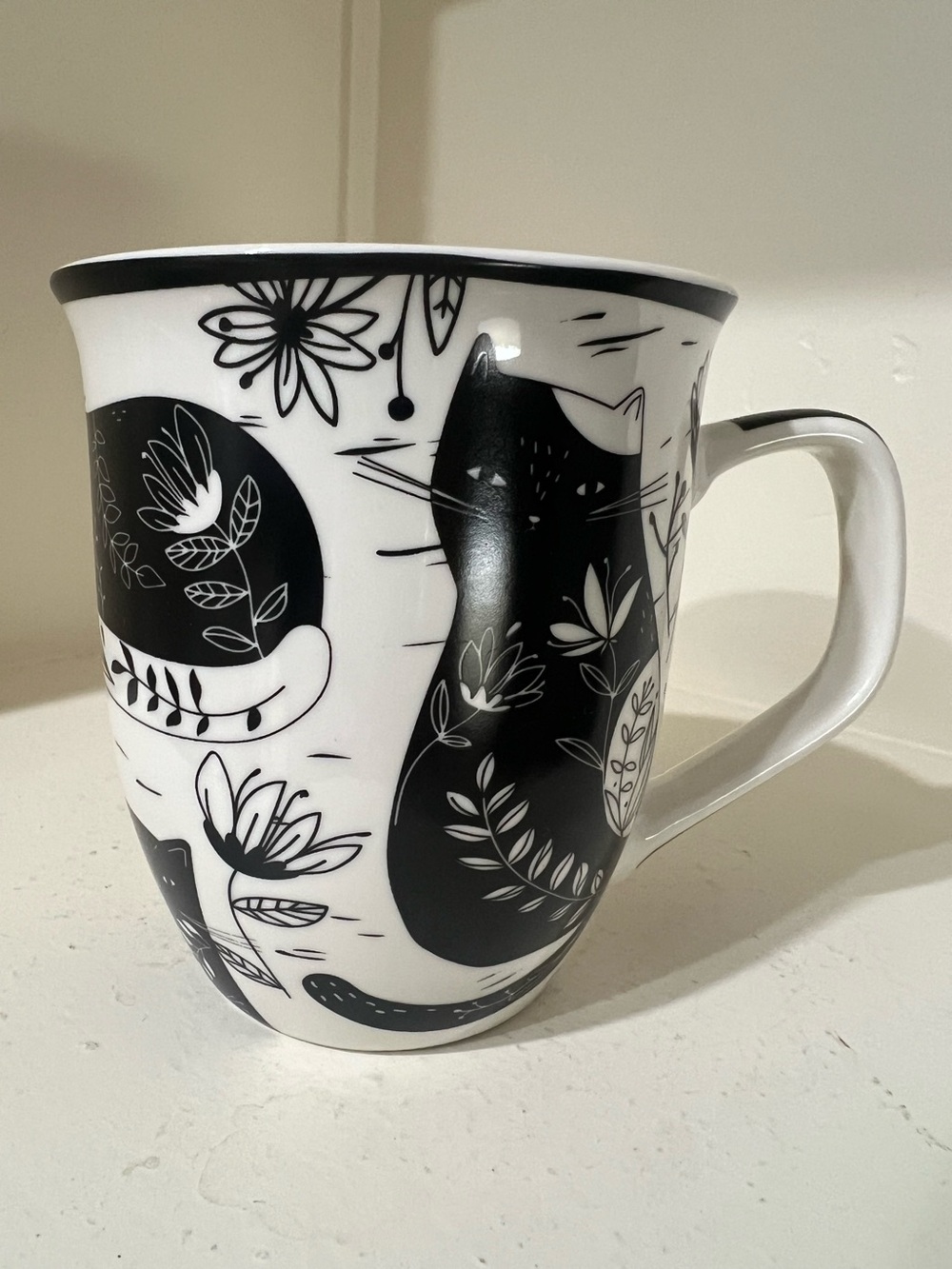 Karma Gifts Black cat and floral coffee mug. 14oz. Perfect condition.